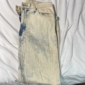 Bleached blue jeans never been worn, and in perfect condition